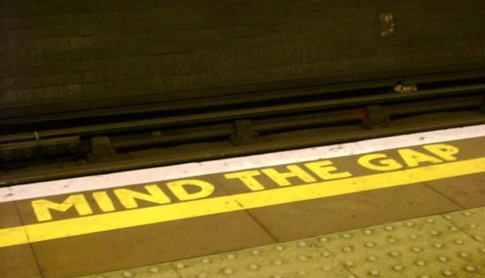 A subway platform with the words " find the one ".