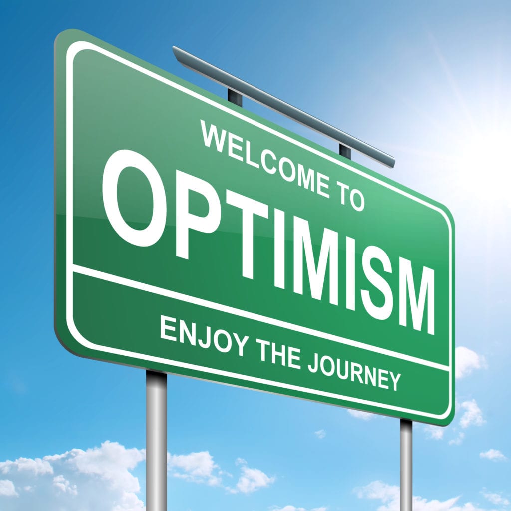 A green sign that says " welcome to optimism."