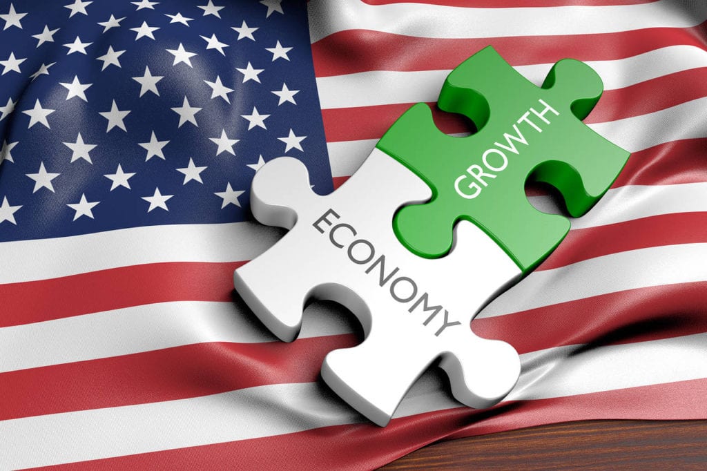 A puzzle piece with the word economy and growth on it.
